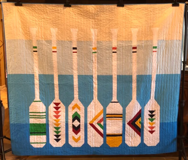 Decorative canoe paddles with geometric designs