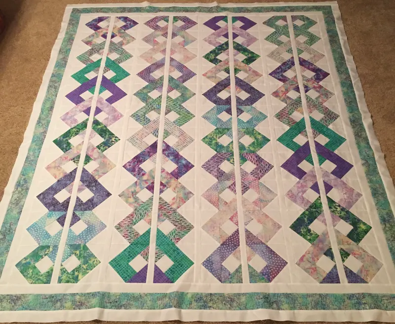 Purple and teal interlocking chain in batik fabrics