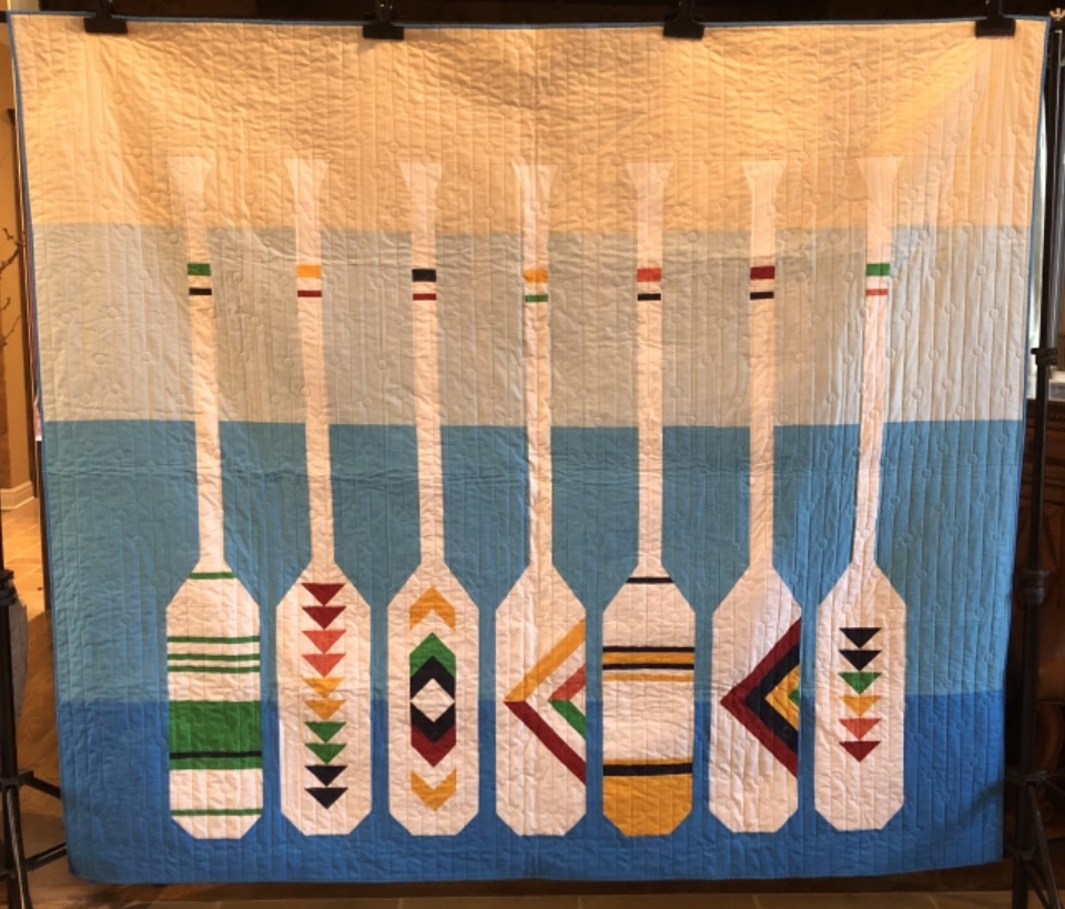 Decorative canoe paddles with geometric designs