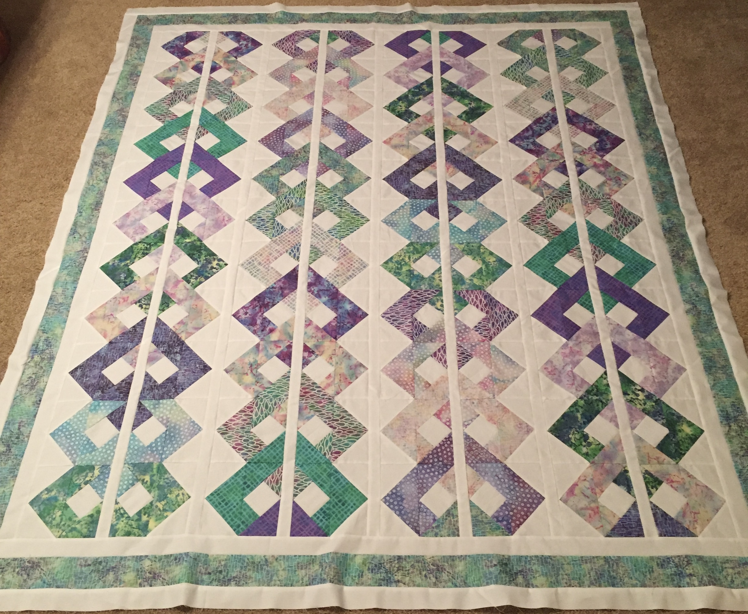 Purple and teal interlocking chain in batik fabrics