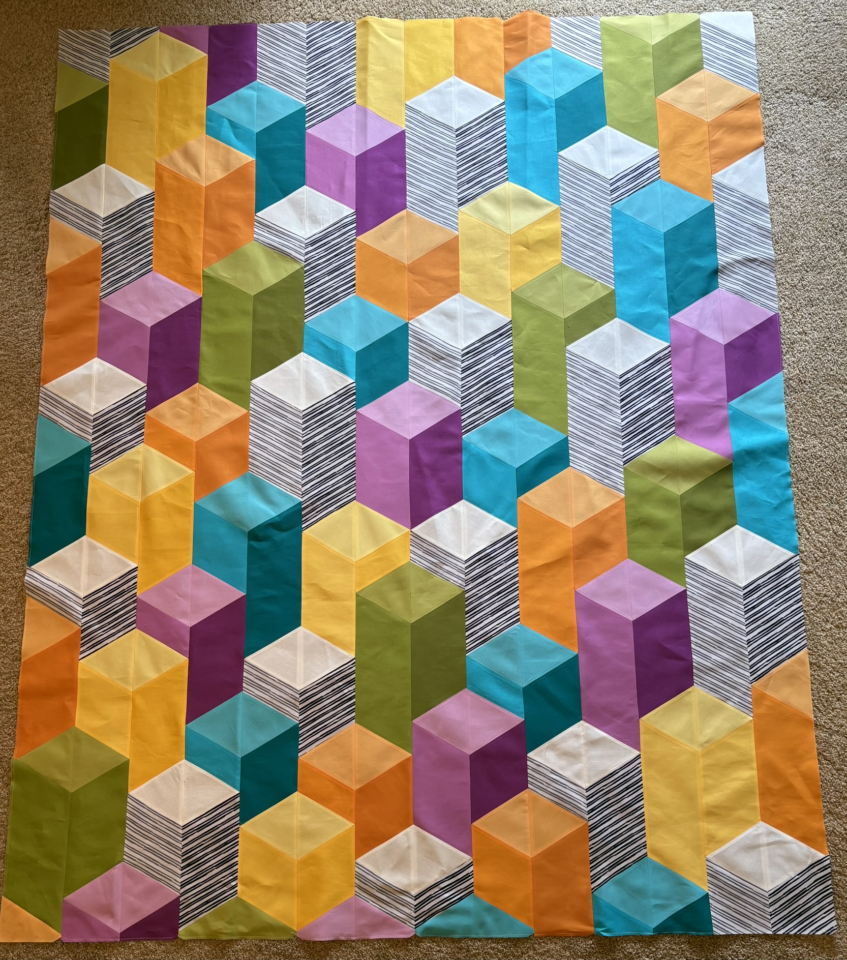 Colorful 3D tumbling blocks in bright pastels