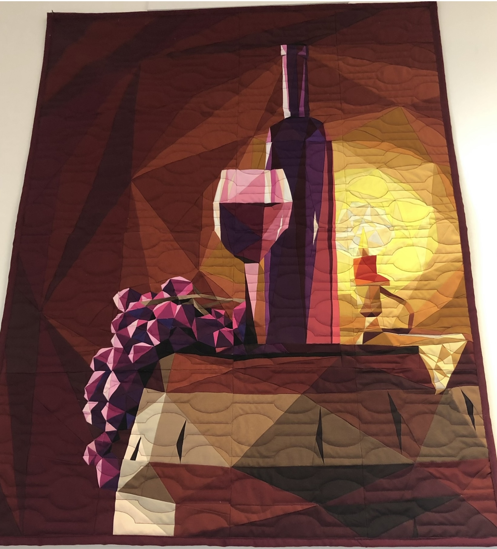 Wine bottle, glass, and grapes still life